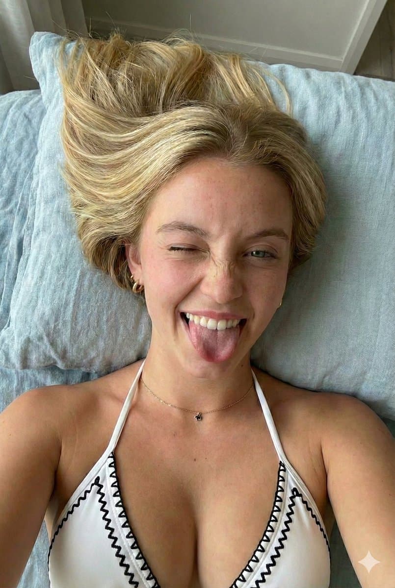 Close-up Portrait of a Playful Young Woman Lying Down — example 2