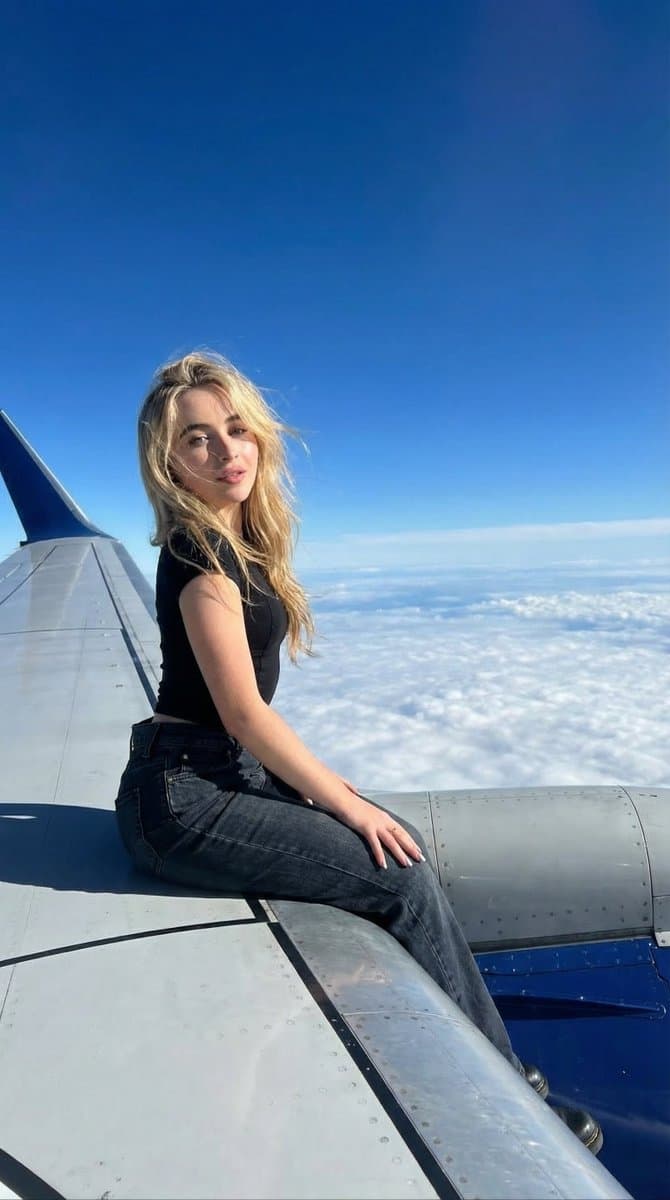 Ultra-Realistic Cinematic Photo of Woman Sitting on an Airplane — example 1