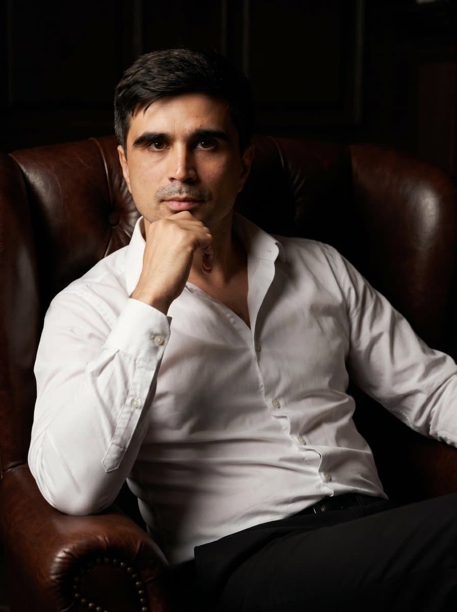 Professional Executive Portrait in Armchair — example 1