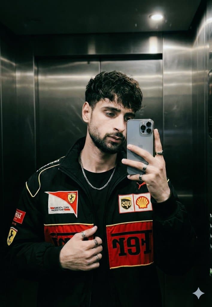 Cinematic mirror selfie in a stainless-steel elevator — example 1